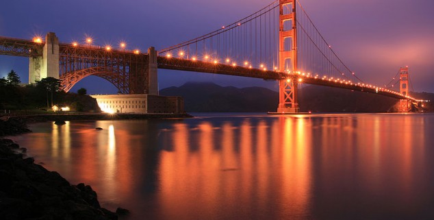 The Golden Gate Bridge by night.