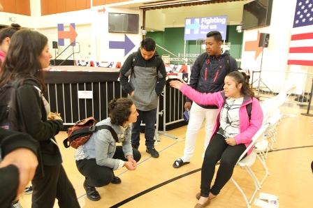 After the Clinton rally, participants chat. Photo: Sam-Omar Hall