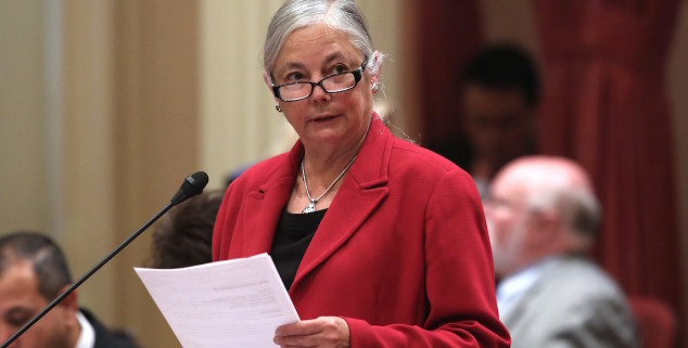 In this photo taken Thursday, April 23, 2015, is Sen. Fran Pavley, D-Agoura Hills, chair of Senate Natural Resources and Water Committee addresses the Senate at the Capitol in Sacramento, Calif., Thursday, April 23, 2015. Pavley joined with the rest of California’s Democratic state senators in sending a letter to Gov. Jerry Brown, urging his administration to get water savings projects started in months instead of years and calling for farmers to step up conservation in the face of a relentless drought.(AP Photo/Rich Pedroncelli)