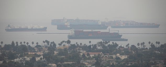 Freighters dock off the Southern California coast on a smoggy day. (Photo: Matt Gush, via Shutterstock)